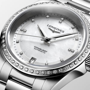 Longines Conquest Automatic (Cadran blanc / 34mm / Lunette diamant)