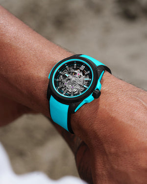 Norqain Independence Wild One Skeleton Auto (Cadran squelette turquoise / 42mm)