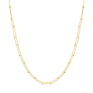 Collection Hemsleys - Collier en or jaune 14 carats à double rang de perles par mètre.